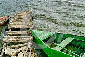 Old Wooden Rowing Fishing Boat Moored Near Lake