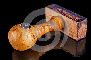 Old wooden rubber stamp on the table. A stamp used in the office