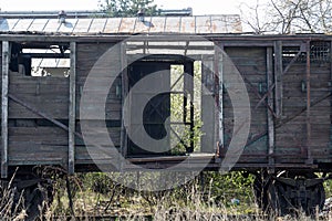 Old wooden ruined boxcar