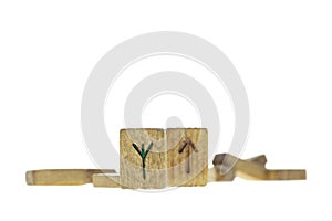 Old wooden runes isolated on a white background