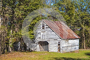 Old wooden rustic style barn in rural Georgia front corner
