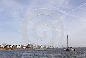 Old wooden sailing vessel near Durgerdam in the netherlands