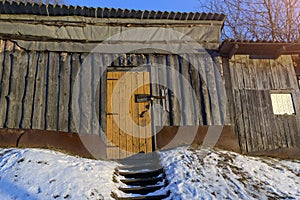 Old wooden shed with padlock