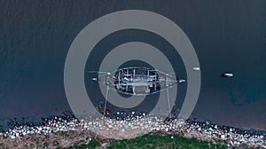 Old wooden ship moored to quays photo