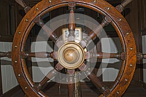 Old wooden ship wheel