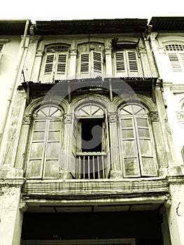 Old wooden shophouse windows photo