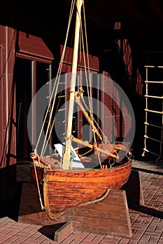 Old wooden skiff in bright brown color