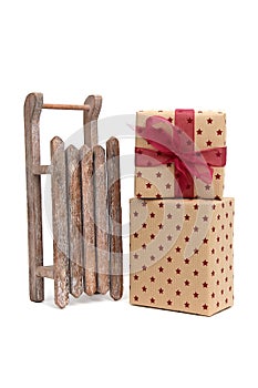 Old wooden sledge with gift
