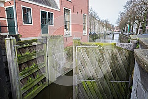 Old wooden sluice in city of Gouda, Netherlands