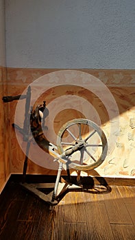 Old wooden spinning wheel