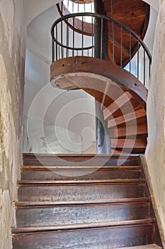 Old wooden spiral staircase - Chindia Tower - landmark attraction in Targoviste, Romania