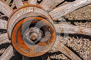 Old wooden spoked wagon wheel