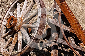 Old wooden spoked wagon wheel,frame