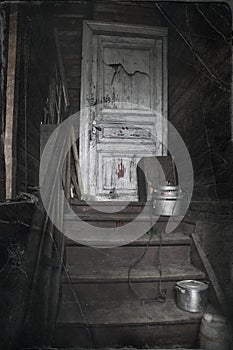 Old wooden staircase in an old abandoned house.