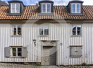 Old wooden swedish house on the island in the middle of Stockholm