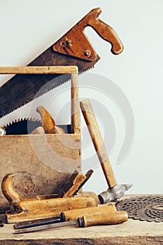 Old Wooden Tool Box Full of Tools. Old carpentry tools. Still life. Place for your text