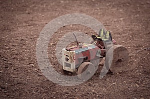 Old wooden toy tractor made with recyclable materials.