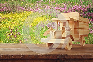 old wooden toy truck car over wooden table