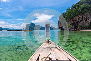 Old wooden traditional boat in Thailand heading