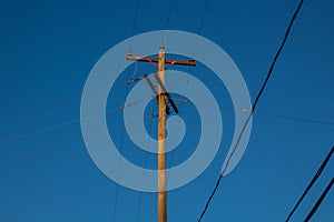 Old wooden traditional electric wire pole