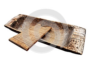 Old wooden trough and washboard on a white photo