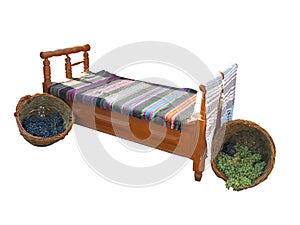 Old wooden vintage bed with carpet and grape basket isolated isolated on white background