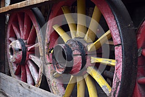 Old wooden wagon wheels in the workshop