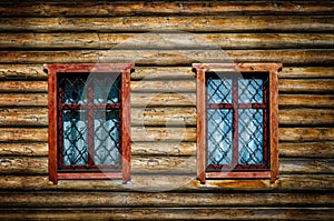 Old wooden wall with windows