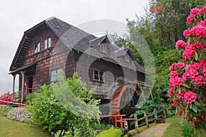 Old wooden water mill in Frutillar village, german colonial muse