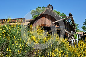 Old wooden water mill, in an old factory in the American far west
