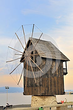 Old wooden windmill photo