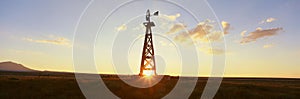 Old Wooden Windmill At Sunset