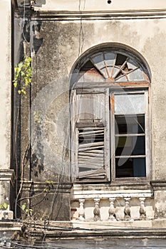 Old Wooden Window on the Abandoned Building