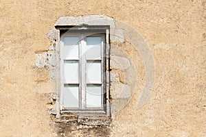 Old wooden window in french house, vintage background