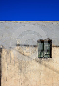 Old wooden window in a Greek village