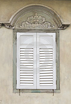 Old wooden window in Sino-Portuguese style at old town