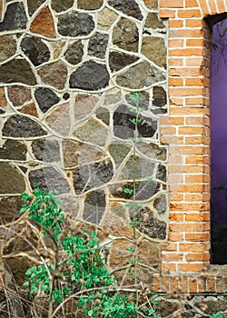 old wooden window on stone wall background