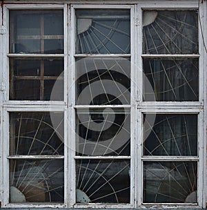 Old wooden window. Vintage frame texture with peeling paint.