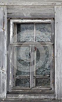 Old wooden window. Vintage frame texture with peeling paint.