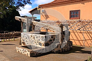 Old wooden wine press for pressing grapes to produce wine on la gomera, canary Islands, spain