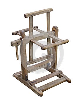 Old wooden wool winder isolated.