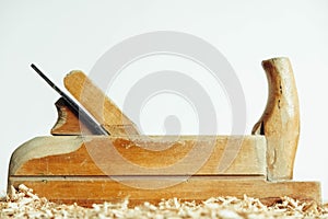Old woodworking hand tool on a white background. Wooden jack-plane on a white background. Copy, empty space for text
