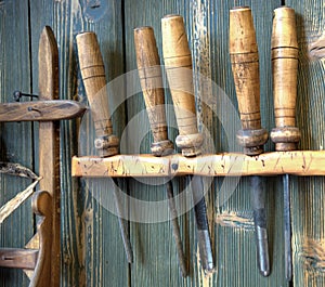 Old woodworking tools on wall photo