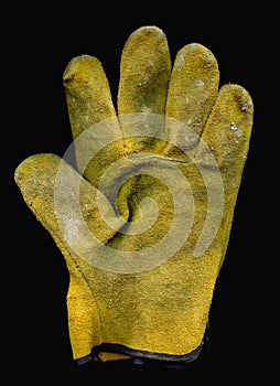 Old work Glove isolated on black background