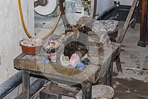Old workbench with vices.