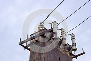 An old working rusty transformer substation in Russia. Electricity in the village