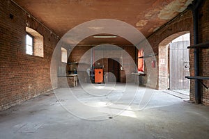 Old workshop interior with brick walls, nobody