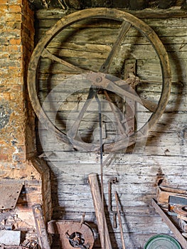 Old workshop smith details with rusty tools and stone walls