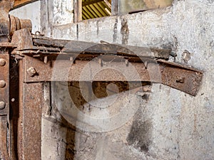 Old workshop smith details with rusty tools and stone walls