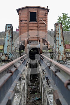 Old workshop of wagons and narrow-gauge railway locomotives. Place of repair and renovation for trains.